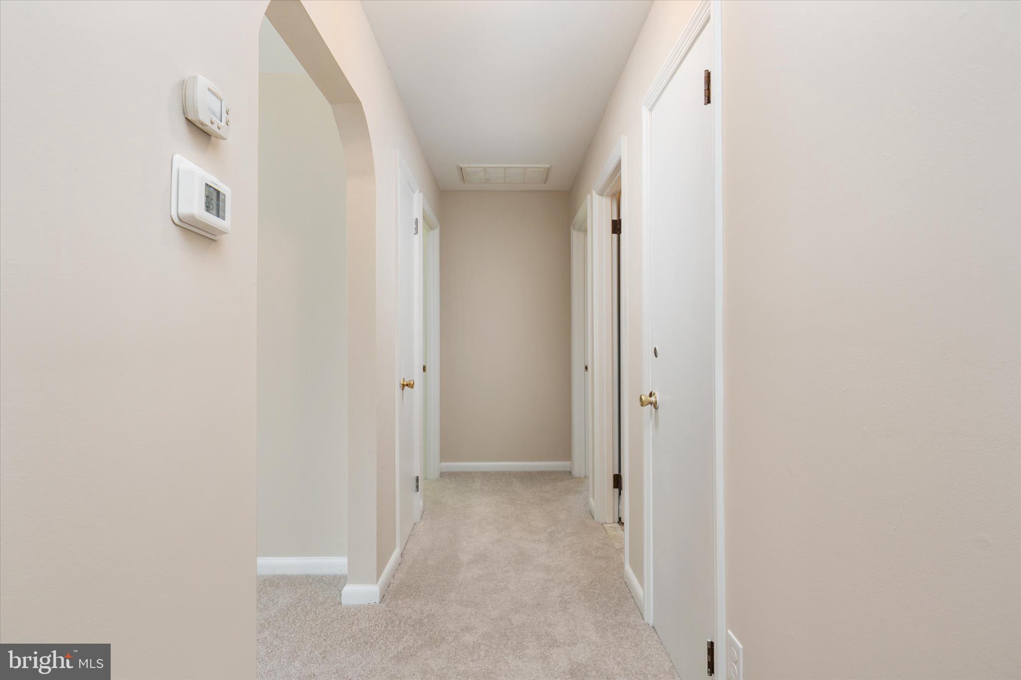 117 Rebel Road Grasonville, MD 21638 - Photo 13 of 46 Hallway leading to Bedrooms 1 & 2 + full bath
