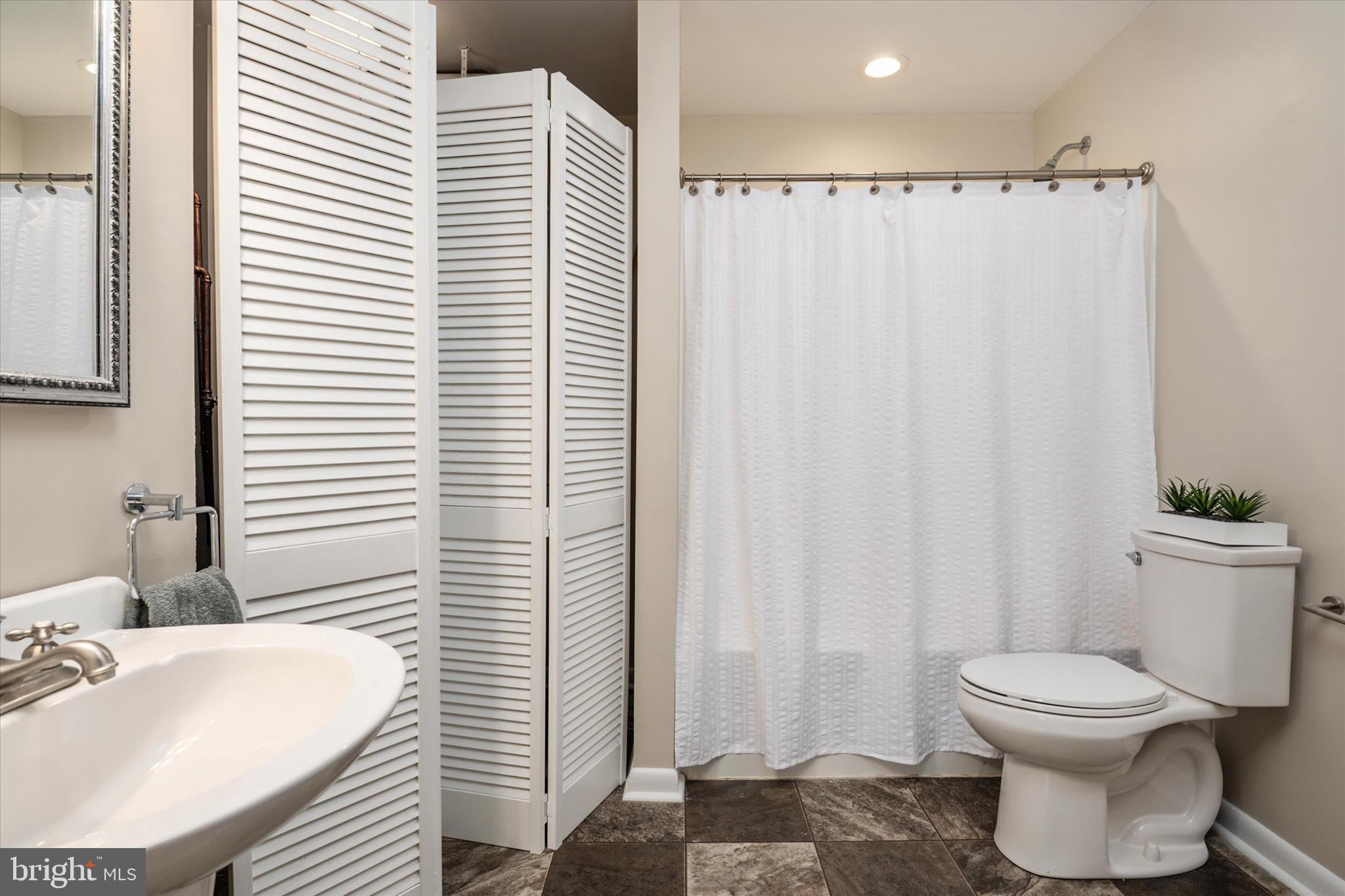 117 Rebel Road Grasonville, MD 21638 - Photo 22 of 46 Full Bathroom off Kitchen + Utility Room screen
