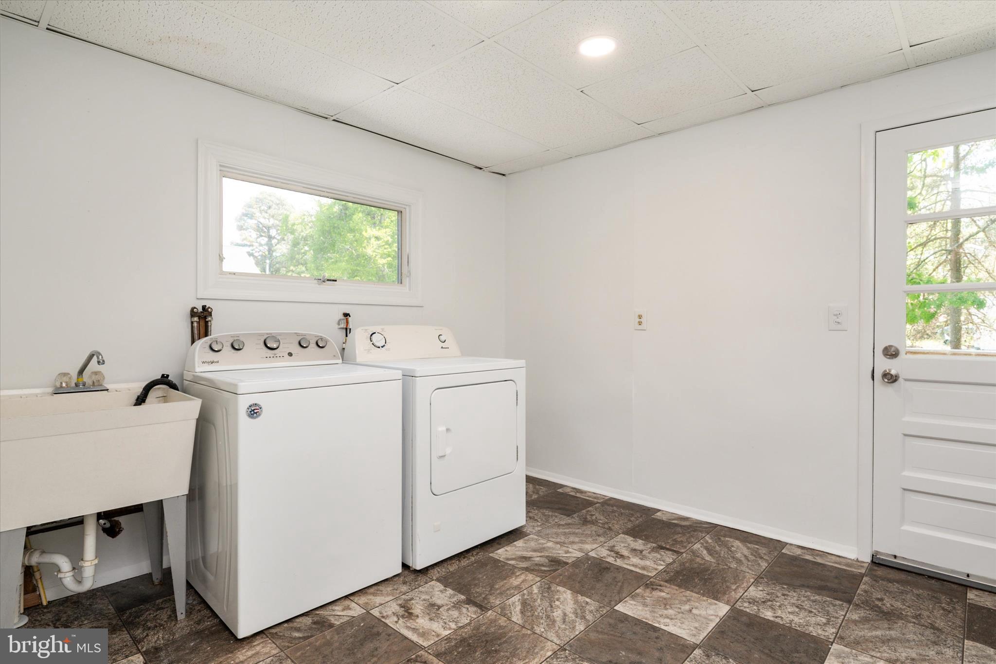117 Rebel Road Grasonville, MD 21638 - Photo 24 of 46 Full Laundry Room in back of Home w/ Deck Access