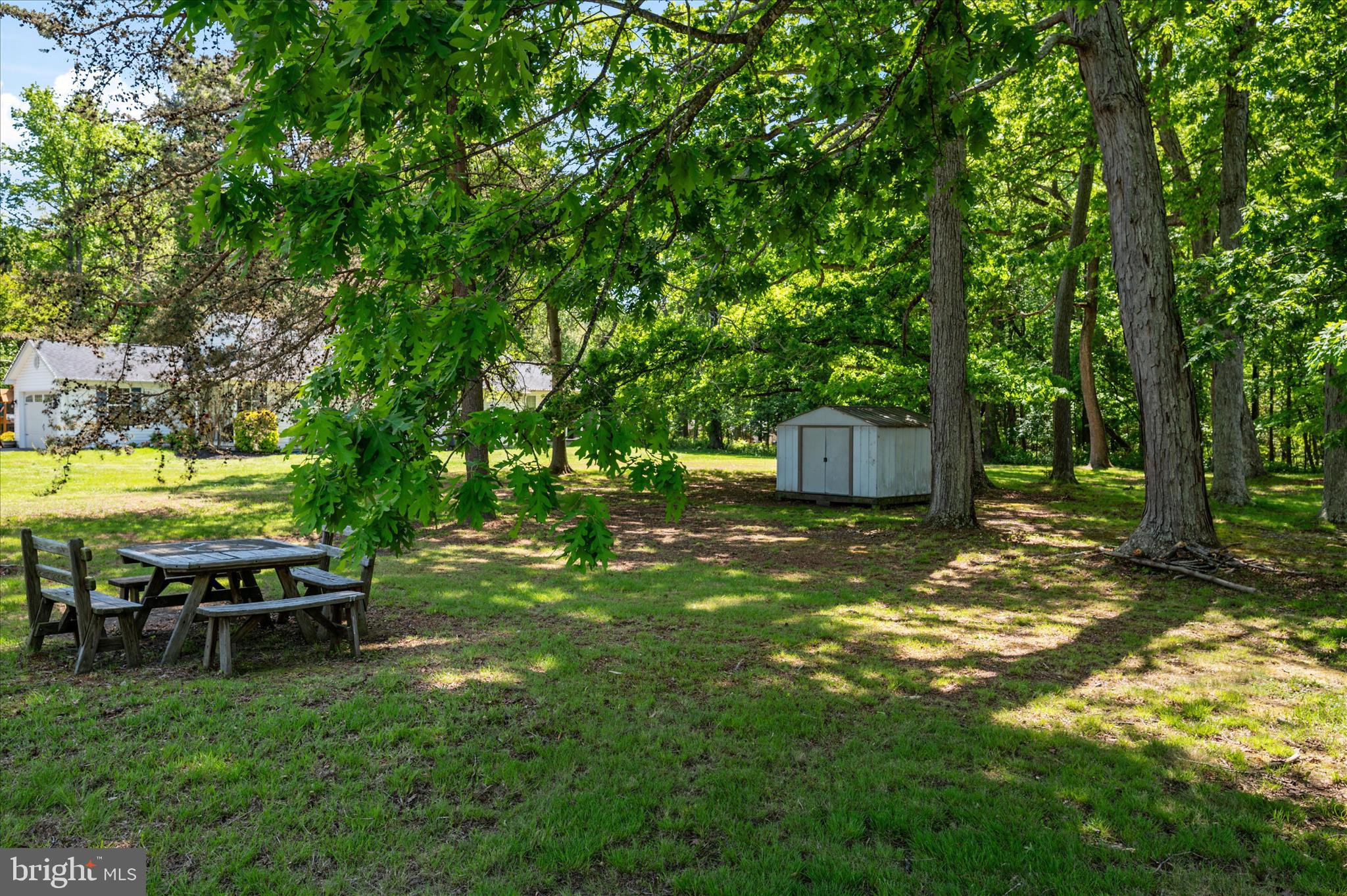 117 Rebel Road Grasonville, MD 21638 - Photo 29 of 46 Metal shed included on the property + picnic table