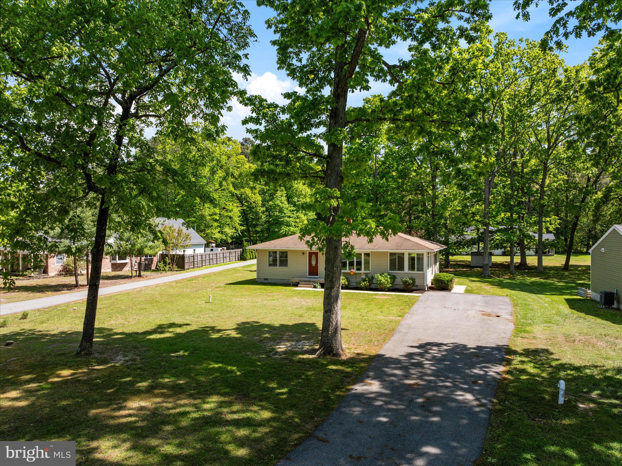 117 Rebel Road Grasonville, MD 21638 - Photo 36 of 46 Spacious paved driveway leading you home