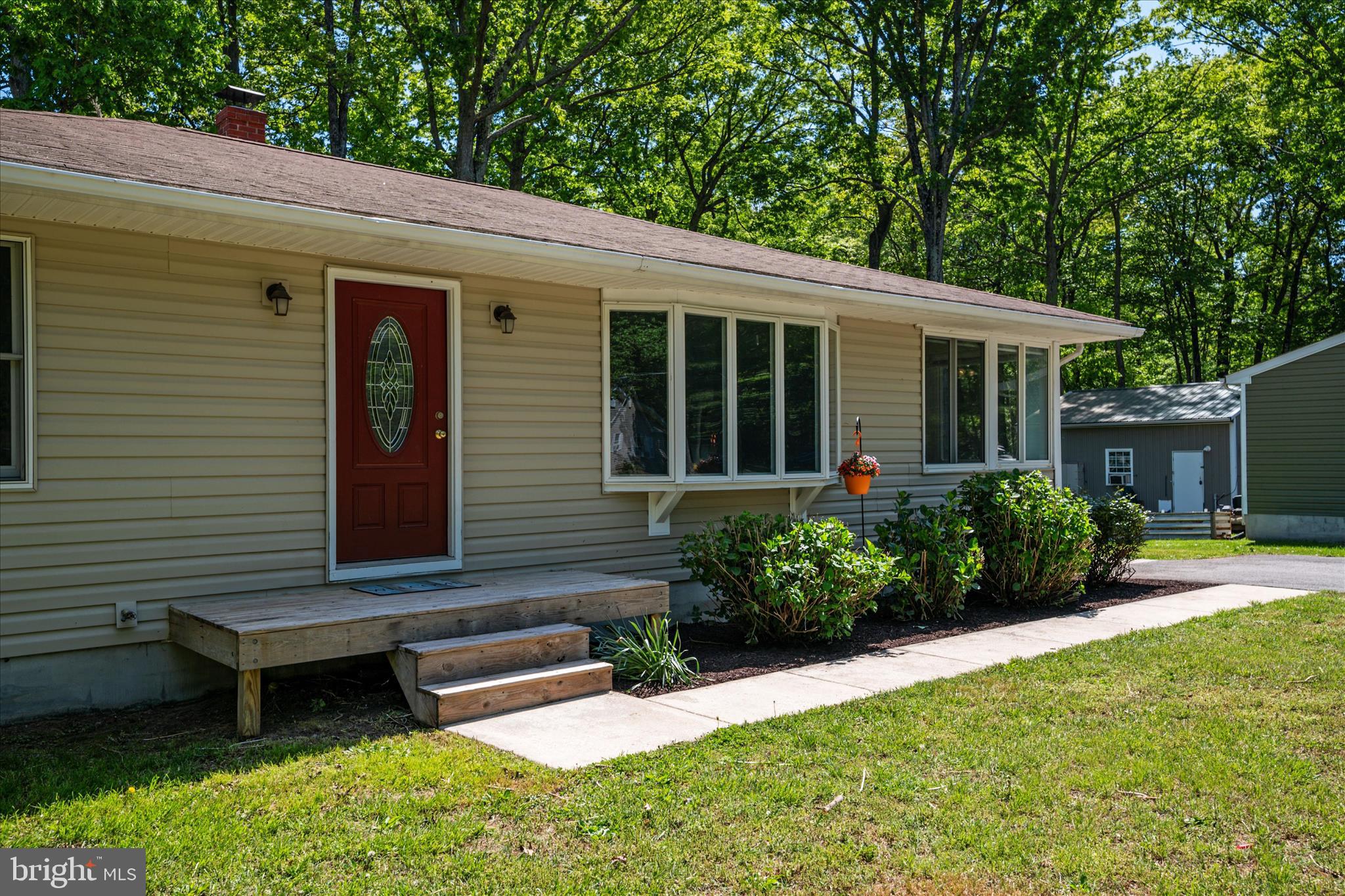 117 Rebel Road Grasonville, MD 21638 - Photo 5 of 46 Refreshed Landscaping on Front & side of home