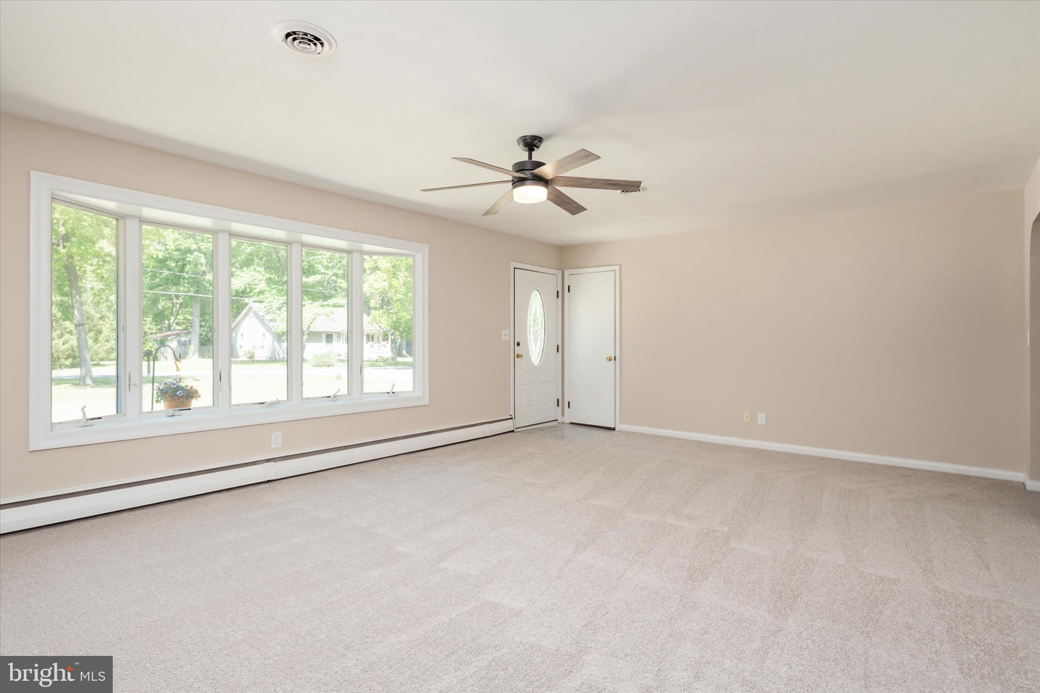 117 Rebel Road Grasonville, MD 21638 - Photo 7 of 46 Incredible Living/Family Room Space w/ Bay window