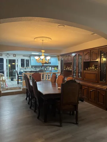 a view of a dining room with furniture