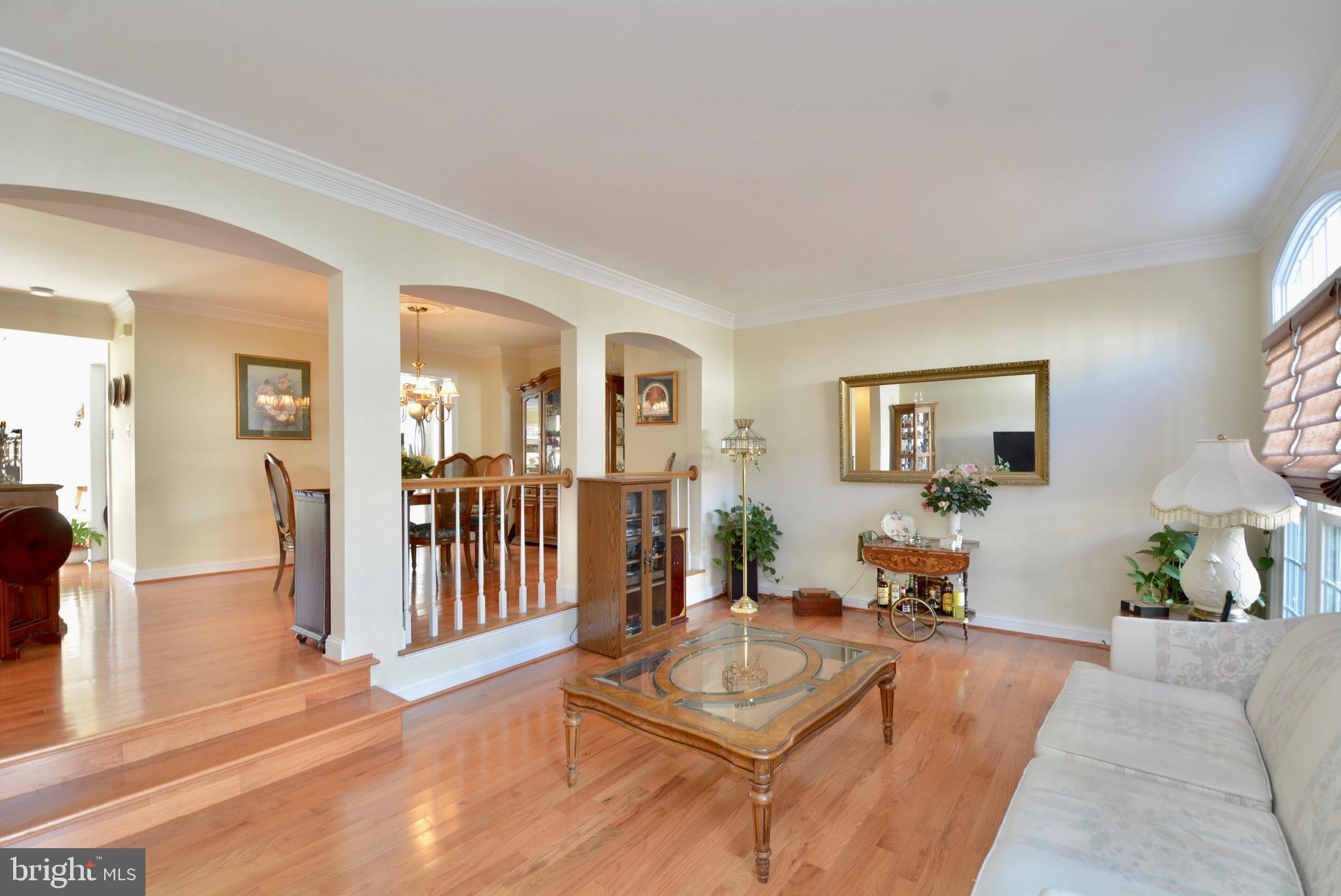 6539 Milva Lane Springfield, VA 22150 - Photo 10 of 31 Large main level living rm opens to the dining rm