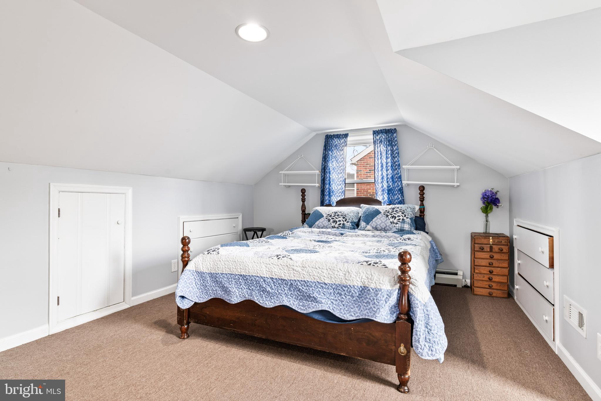 4416 Fullerton Avenue Nottingham, MD 21236 - Photo 21 of 70 a bedroom with a bed and a refrigerator