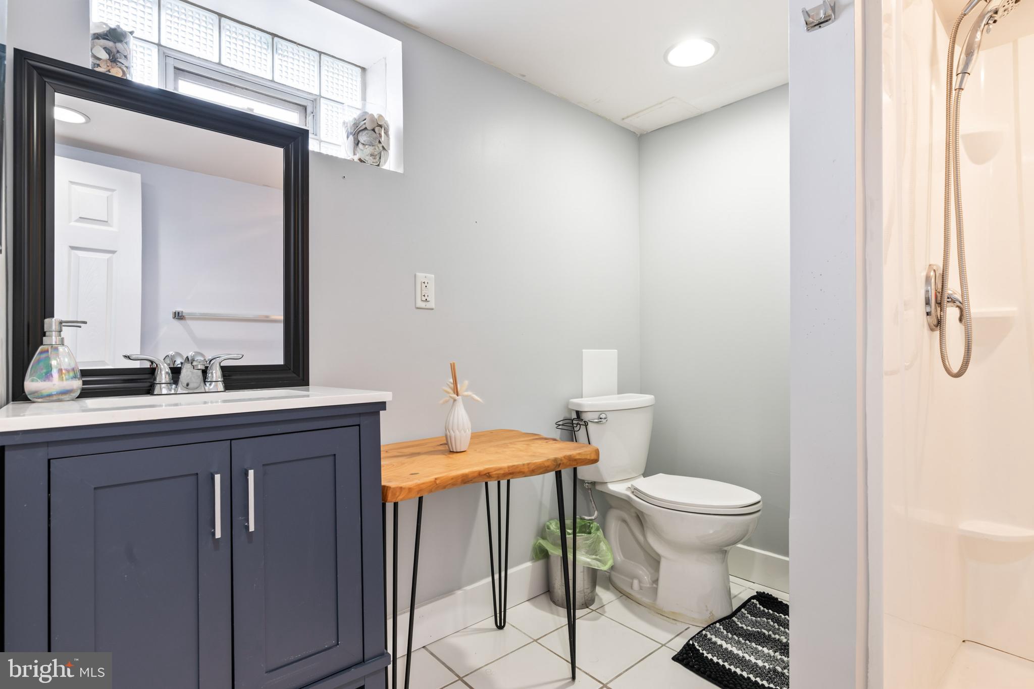 4416 Fullerton Avenue Nottingham, MD 21236 - Photo 42 of 70 a bathroom with a toilet a sink and a mirror