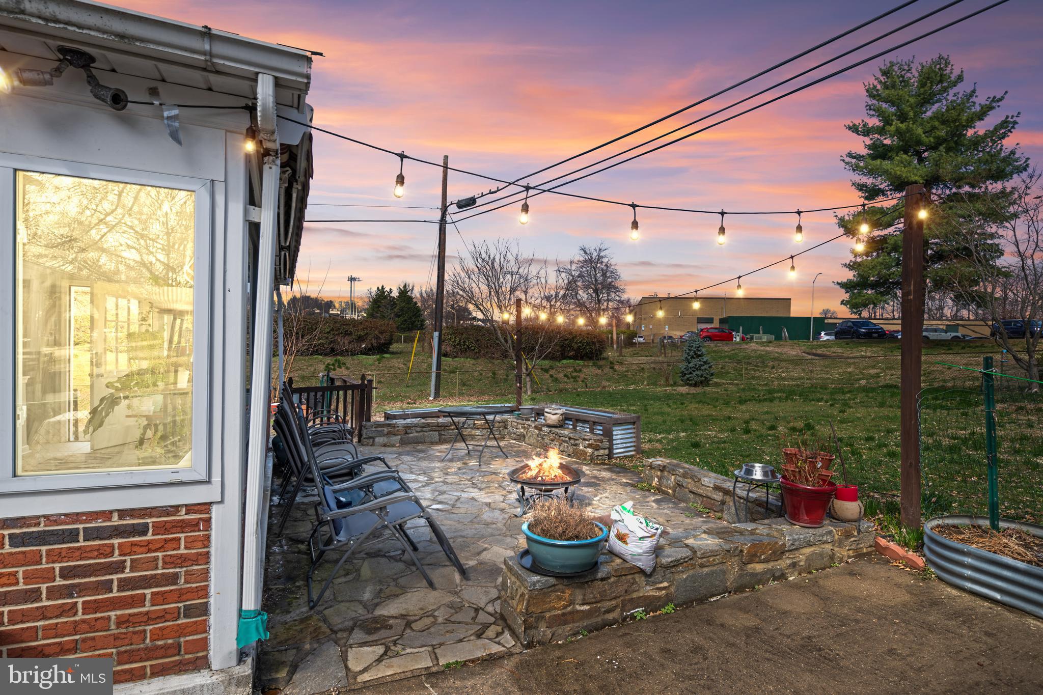 4416 Fullerton Avenue Nottingham, MD 21236 - Photo 48 of 70 a view of a patio with a table chairs and a backyard