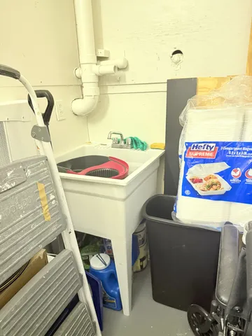 a view of a bathroom from a door