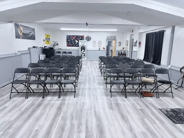 a kitchen with a table and chairs in it