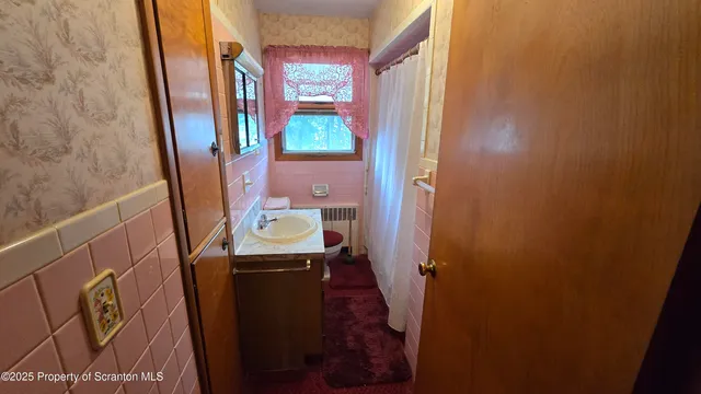 a bathroom with a bathtub