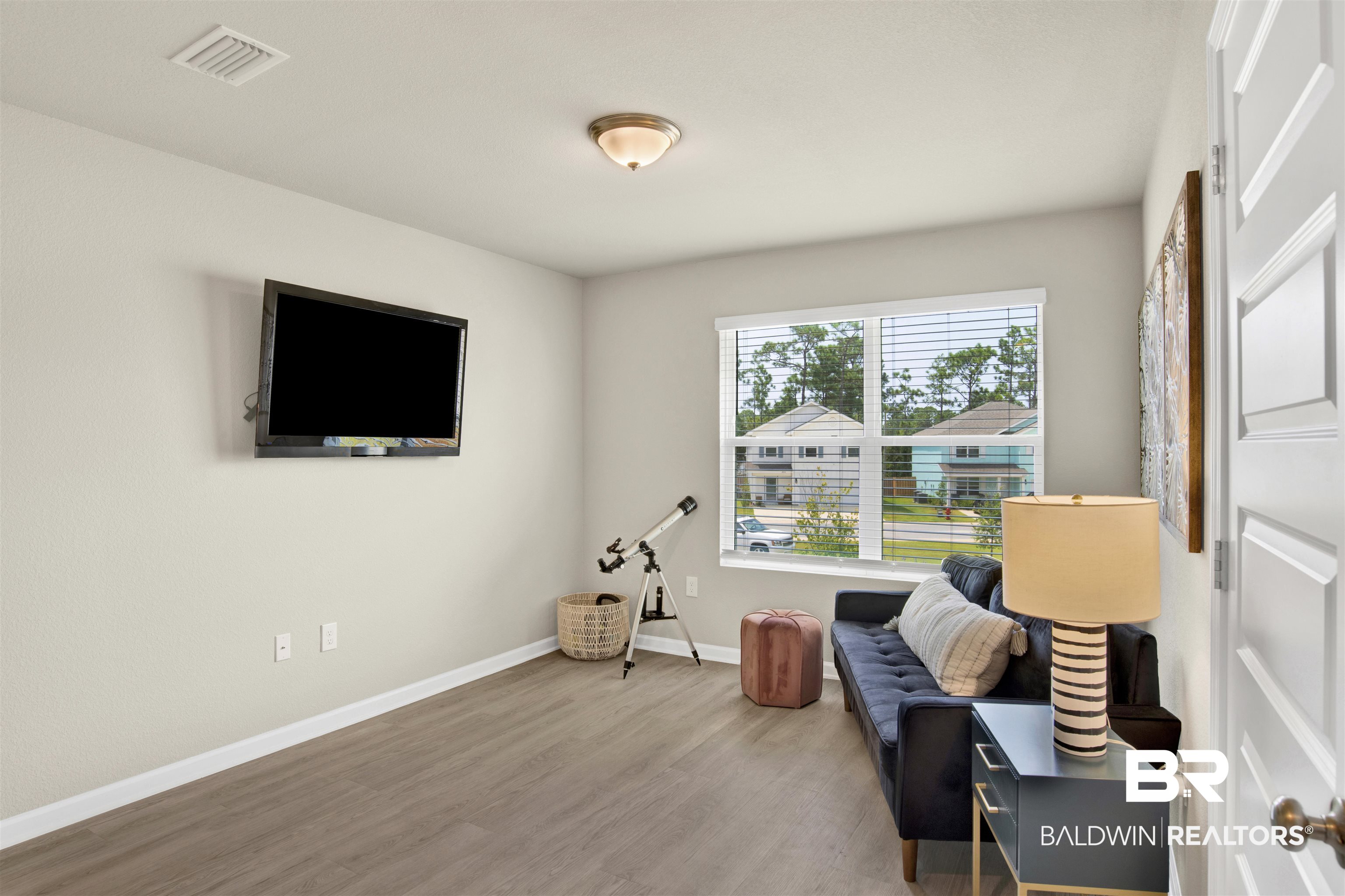 24532 Broken Sound Loop Orange Beach, AL 36561 - Photo 21 of 29 Sitting room with hardwood / wood-style floors