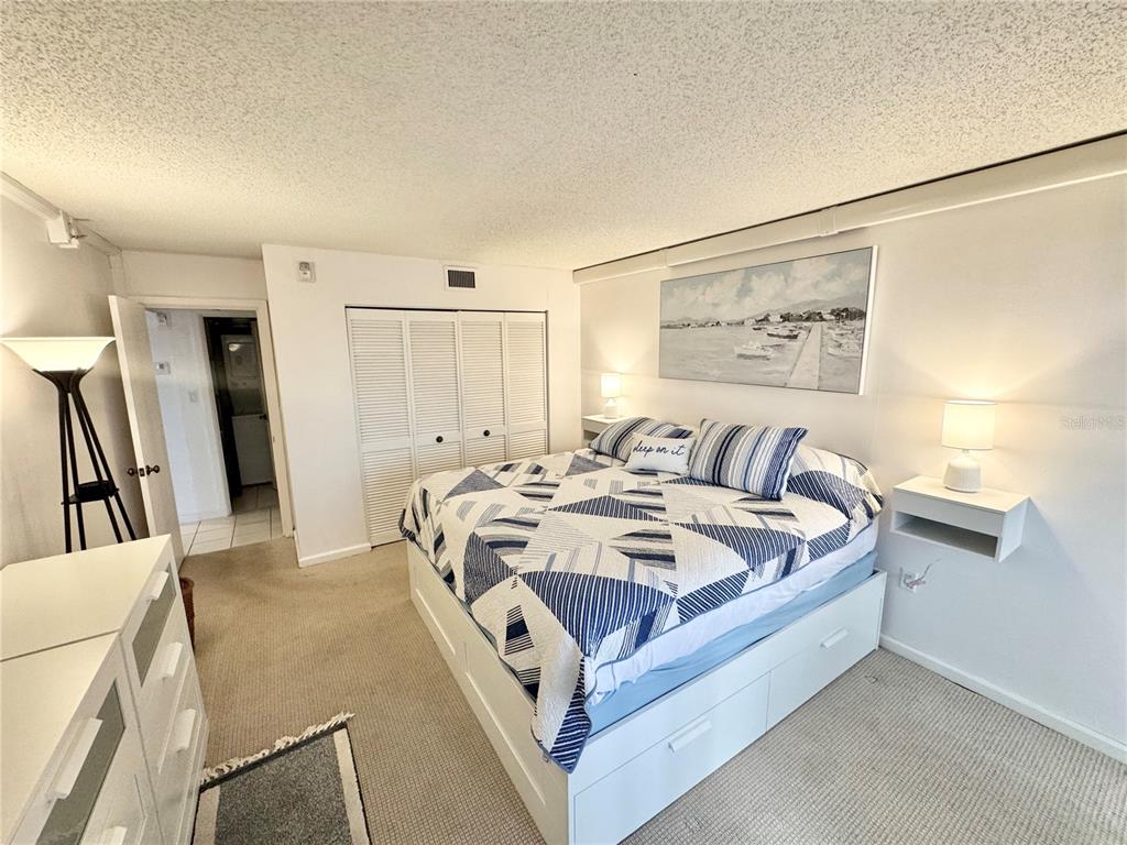 3170 Matecumbe Key Road, Unit 115 Punta Gorda, FL 33955 - Photo 14 of 43 a living room with furniture and a table