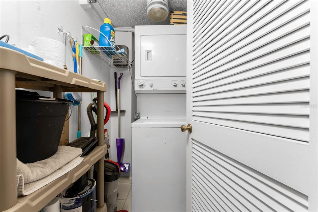 3170 Matecumbe Key Road, Unit 115 Punta Gorda, FL 33955 - Photo 16 of 59 a utility room with dryer and washer