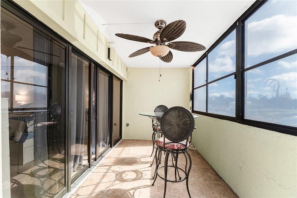 3170 Matecumbe Key Road, Unit 115 Punta Gorda, FL 33955 - Photo 23 of 59 a living room with furniture and a window