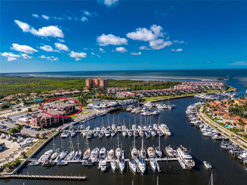 3170 Matecumbe Key Road, Unit 115 Punta Gorda, FL 33955 - Photo 55 of 59 a view of a city with lots of potted plants