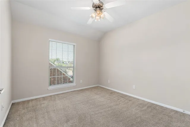 a bathroom with a sink toilet a mirror and shower