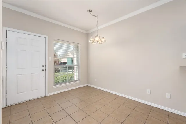 a view of an empty room with window