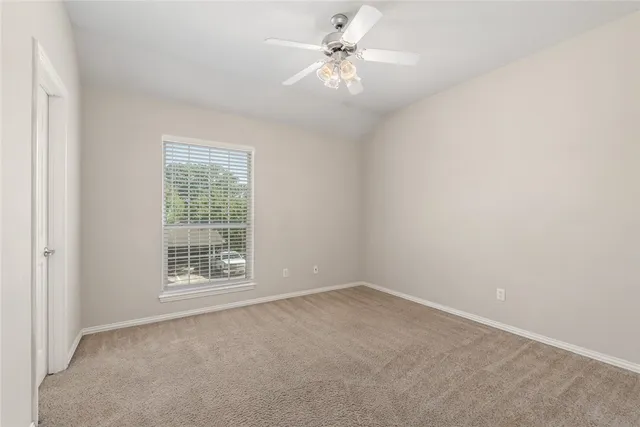 a kitchen with a sink stove and refrigerator