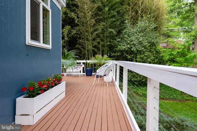 a view of balcony with furniture