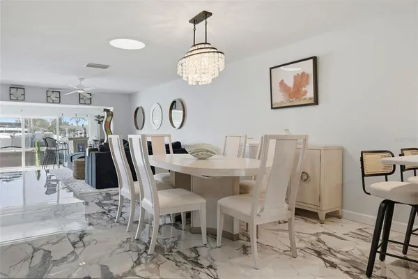 a view of a dining room with furniture