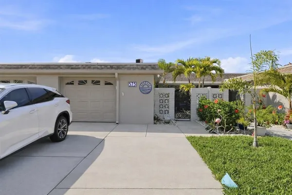 a view of a car parked in front of a building