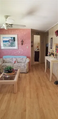 a spacious bathroom with a sink and a large mirror