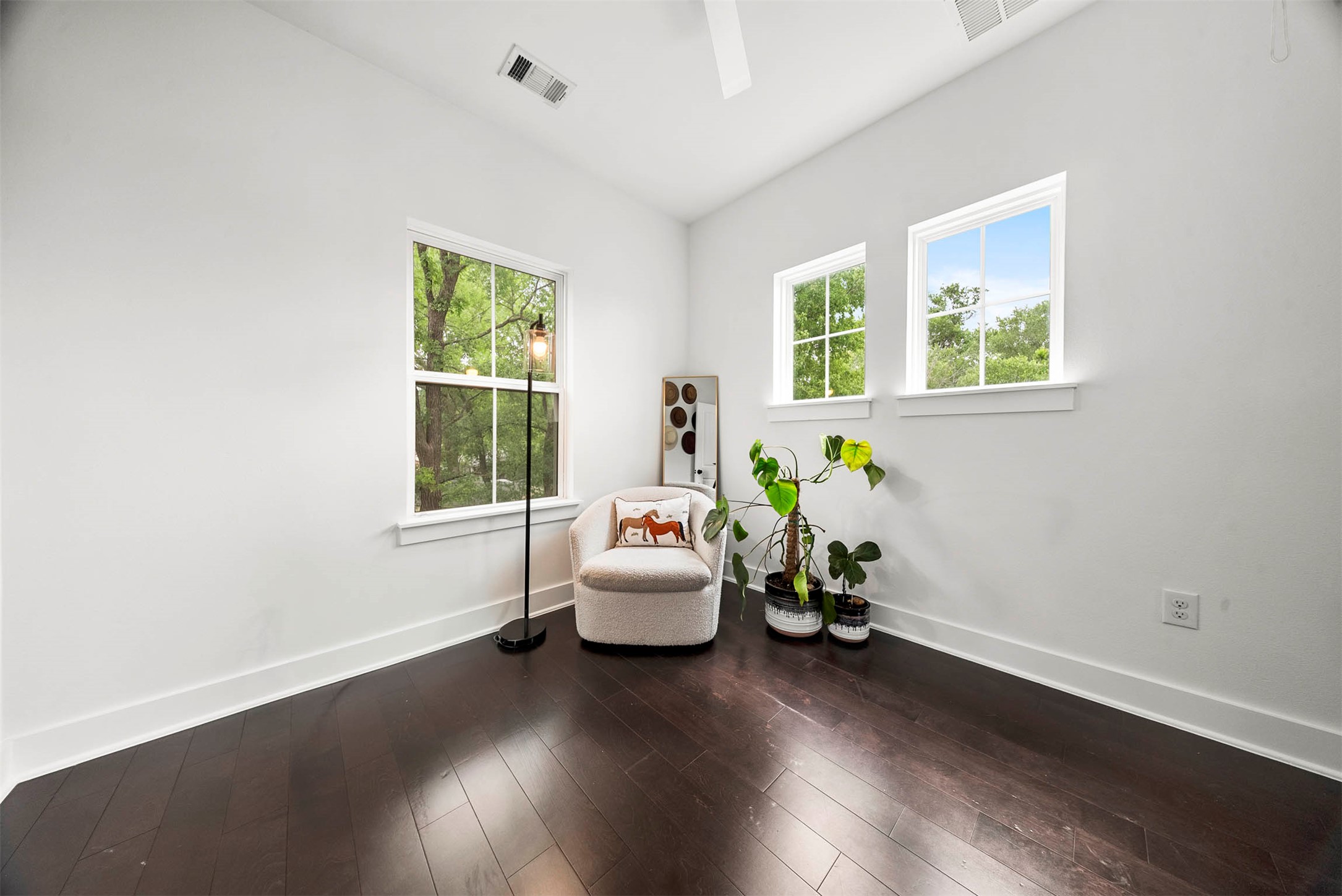 1213 Eleanor Street, Unit B Austin, TX 78721 - Photo 24 of 35 The second bedroom also features wood flooring and its own private ensuite, making it an ideal guest space