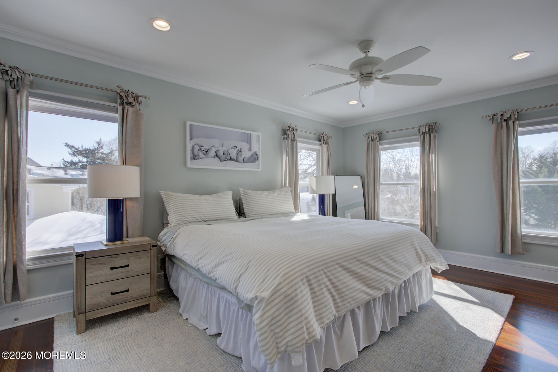 39 River Road Rumson, NJ 07760 - Photo 15 of 36 a bedroom with a bed and large window
