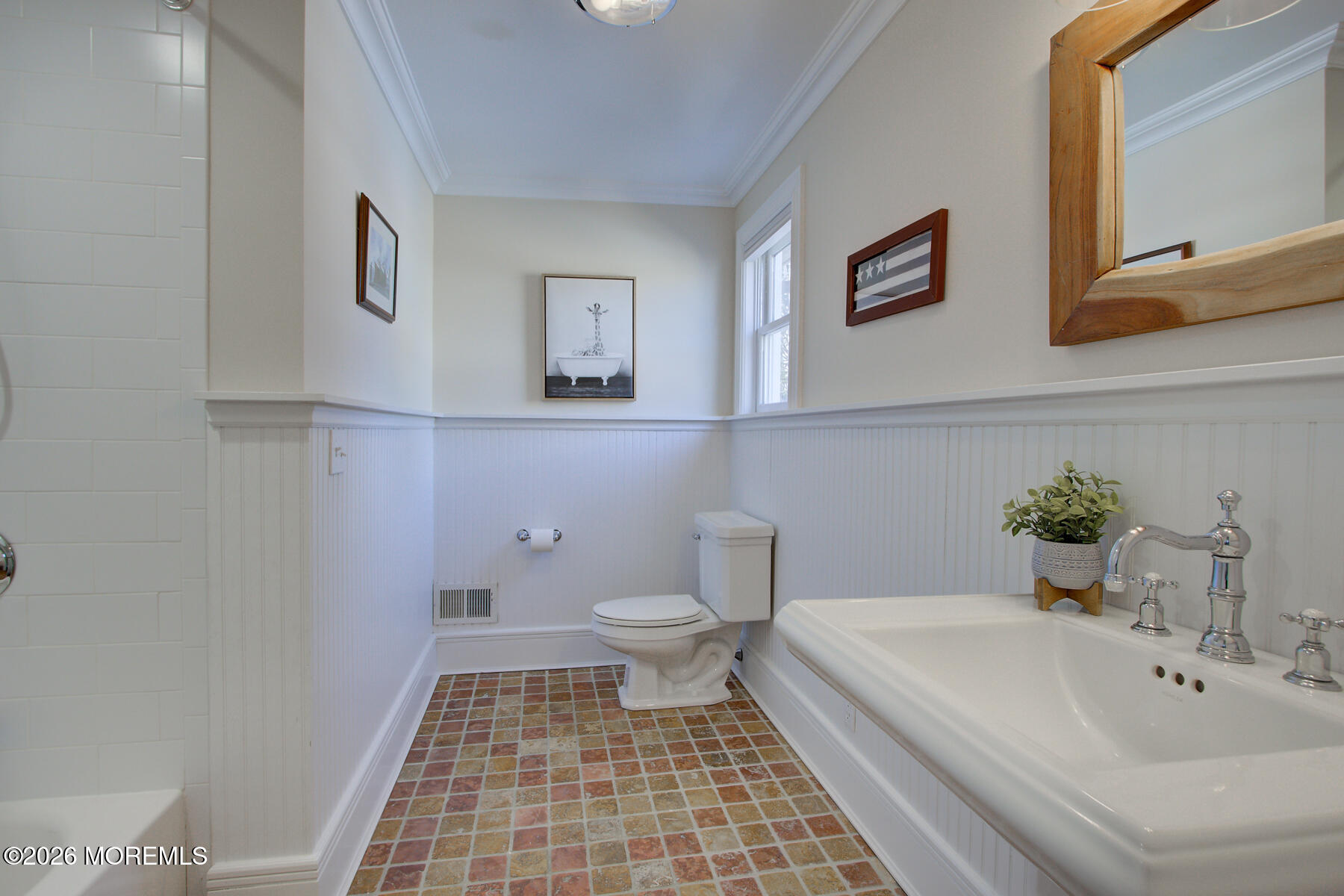 39 River Road Rumson, NJ 07760 - Photo 22 of 36 a bathroom with a sink and a bathtub