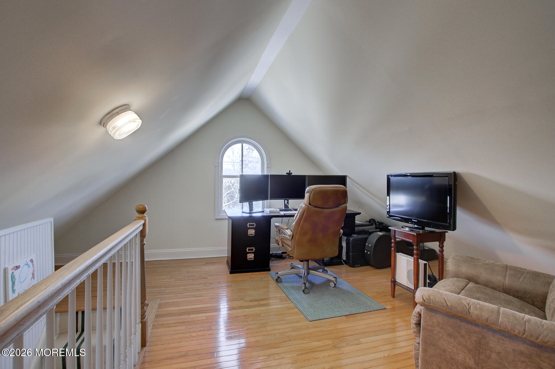 39 River Road Rumson, NJ 07760 - Photo 24 of 36 a view of a livingroom with workspace and a couch