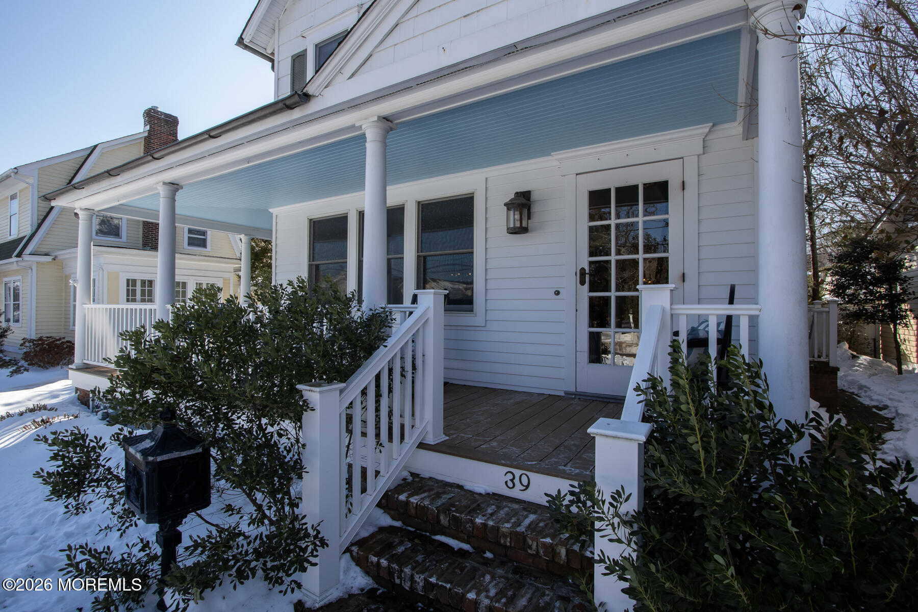 39 River Road Rumson, NJ 07760 - Photo 28 of 36 front view of house with a potted plant