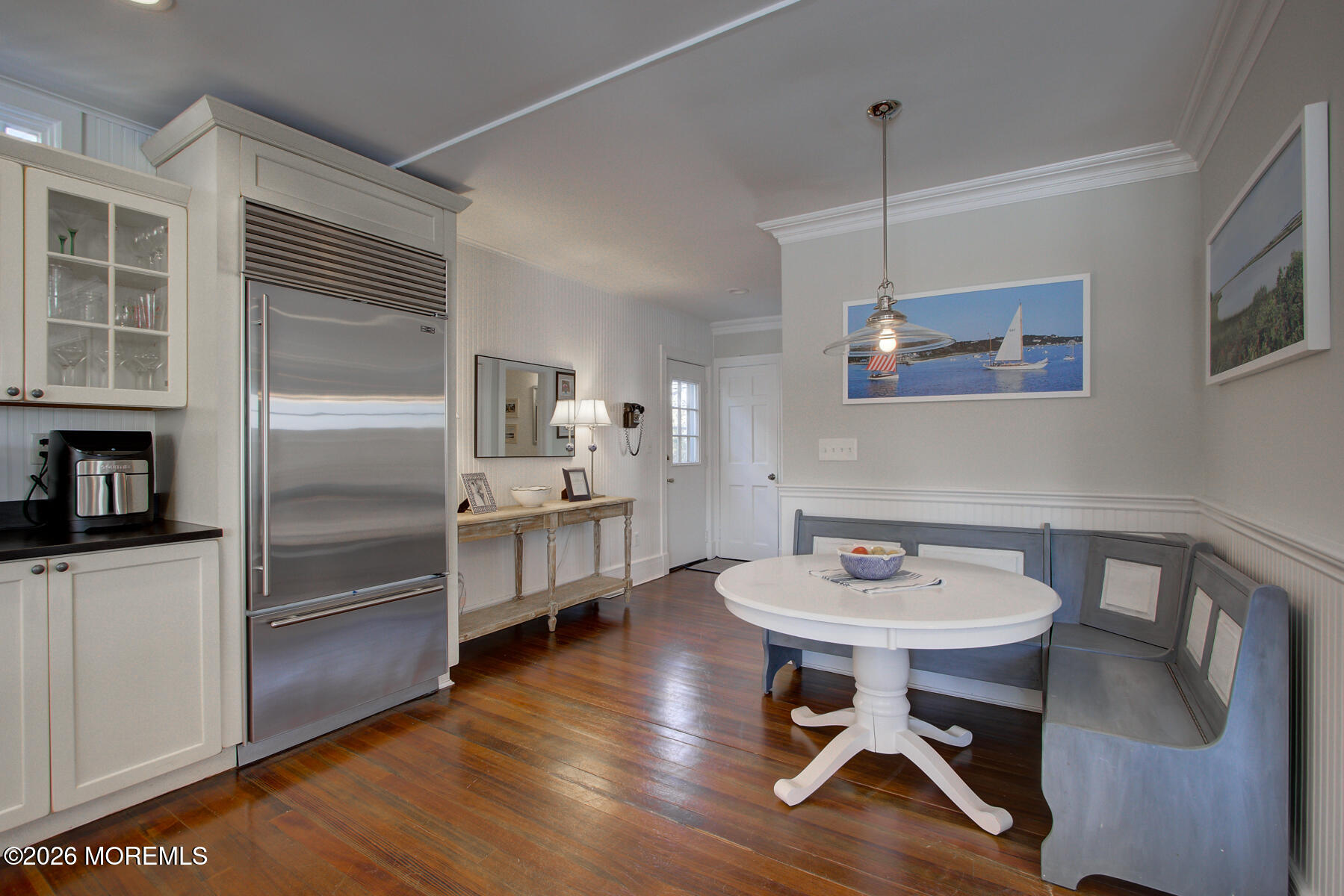 39 River Road Rumson, NJ 07760 - Photo 9 of 36 a kitchen with a sink appliances and chairs