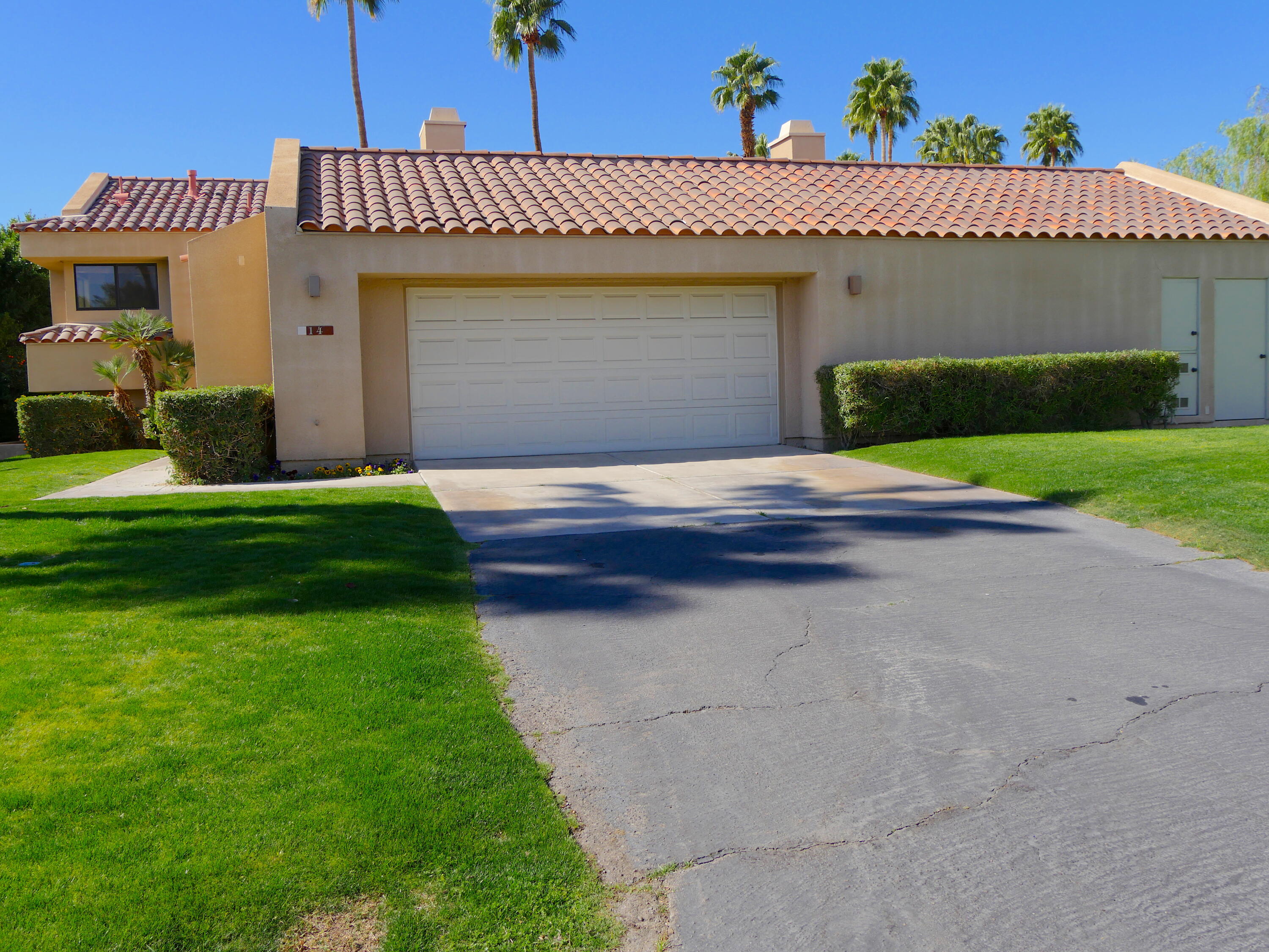 14 Mission Court Rancho Mirage, CA 92270 - Photo 1 of 17 a view of front of house with yard
