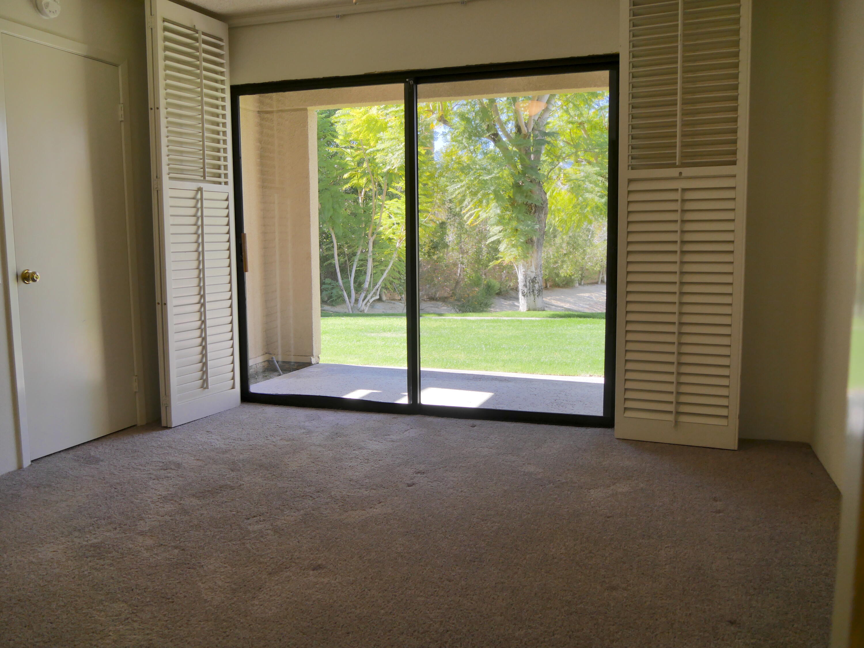 14 Mission Court Rancho Mirage, CA 92270 - Photo 16 of 17 a view of room with floor to ceiling window
