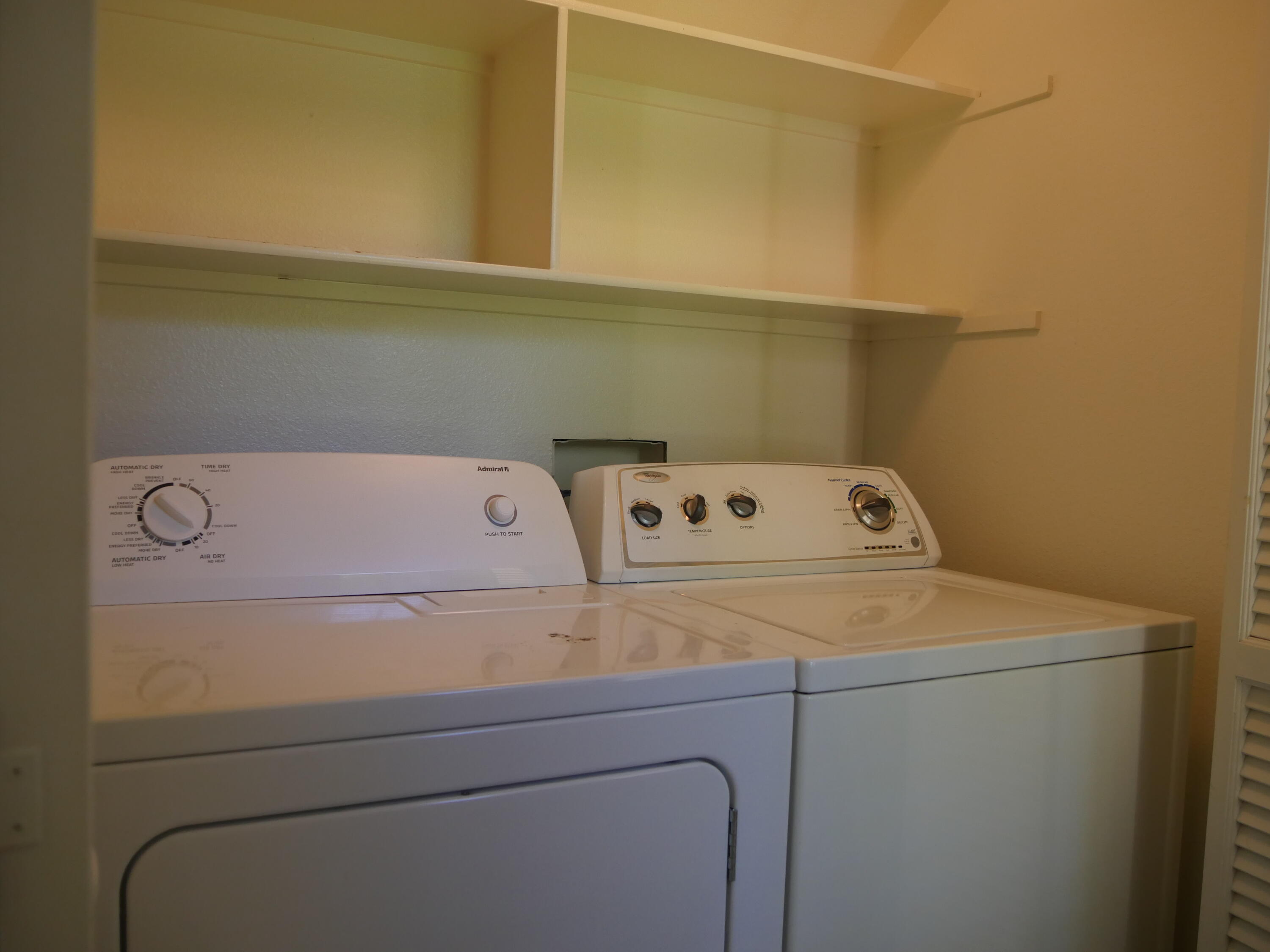 14 Mission Court Rancho Mirage, CA 92270 - Photo 17 of 17 a utility room with dryer and washer