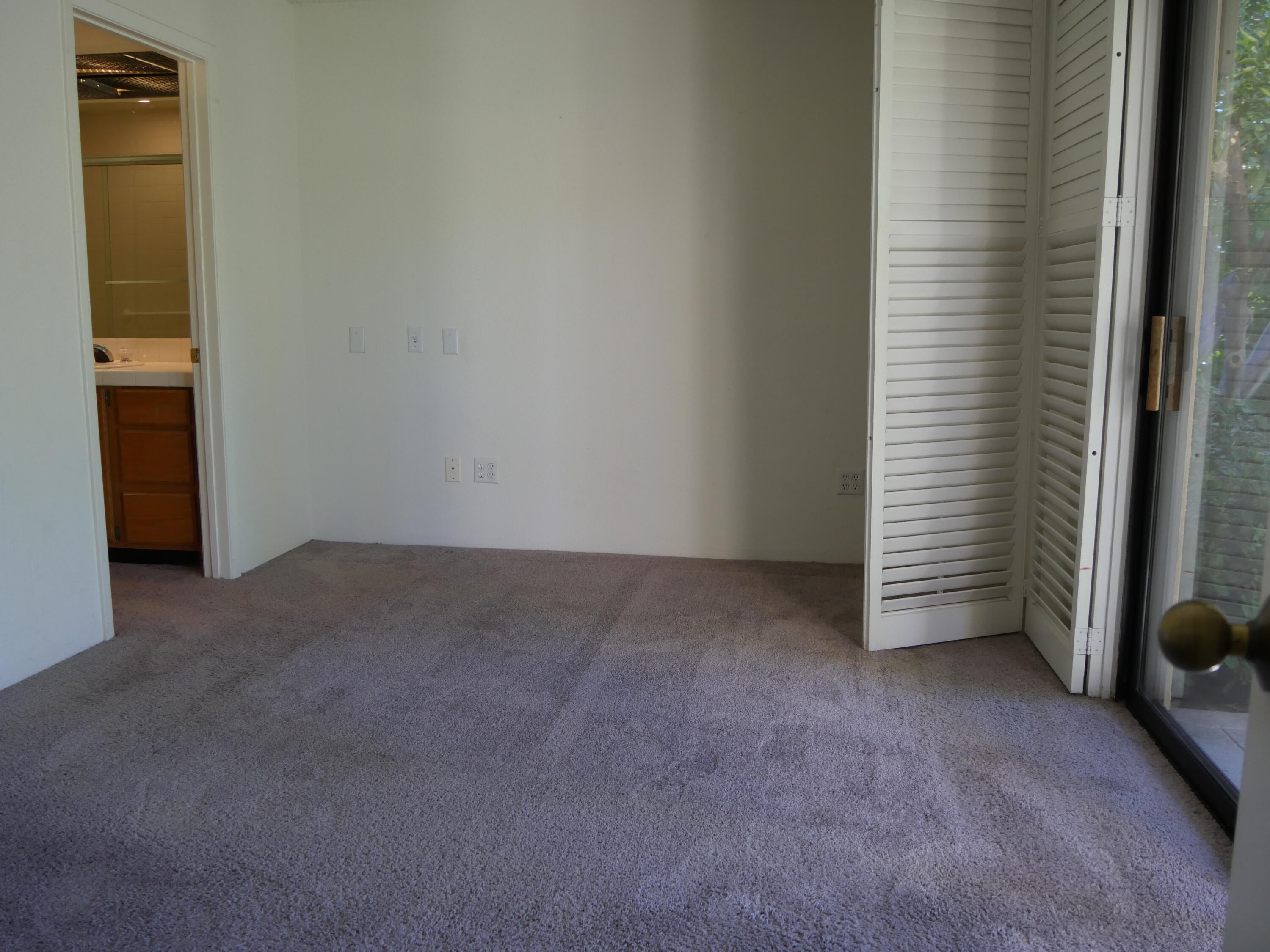 14 Mission Court Rancho Mirage, CA 92270 - Photo 10 of 17 a view of a room that has a window