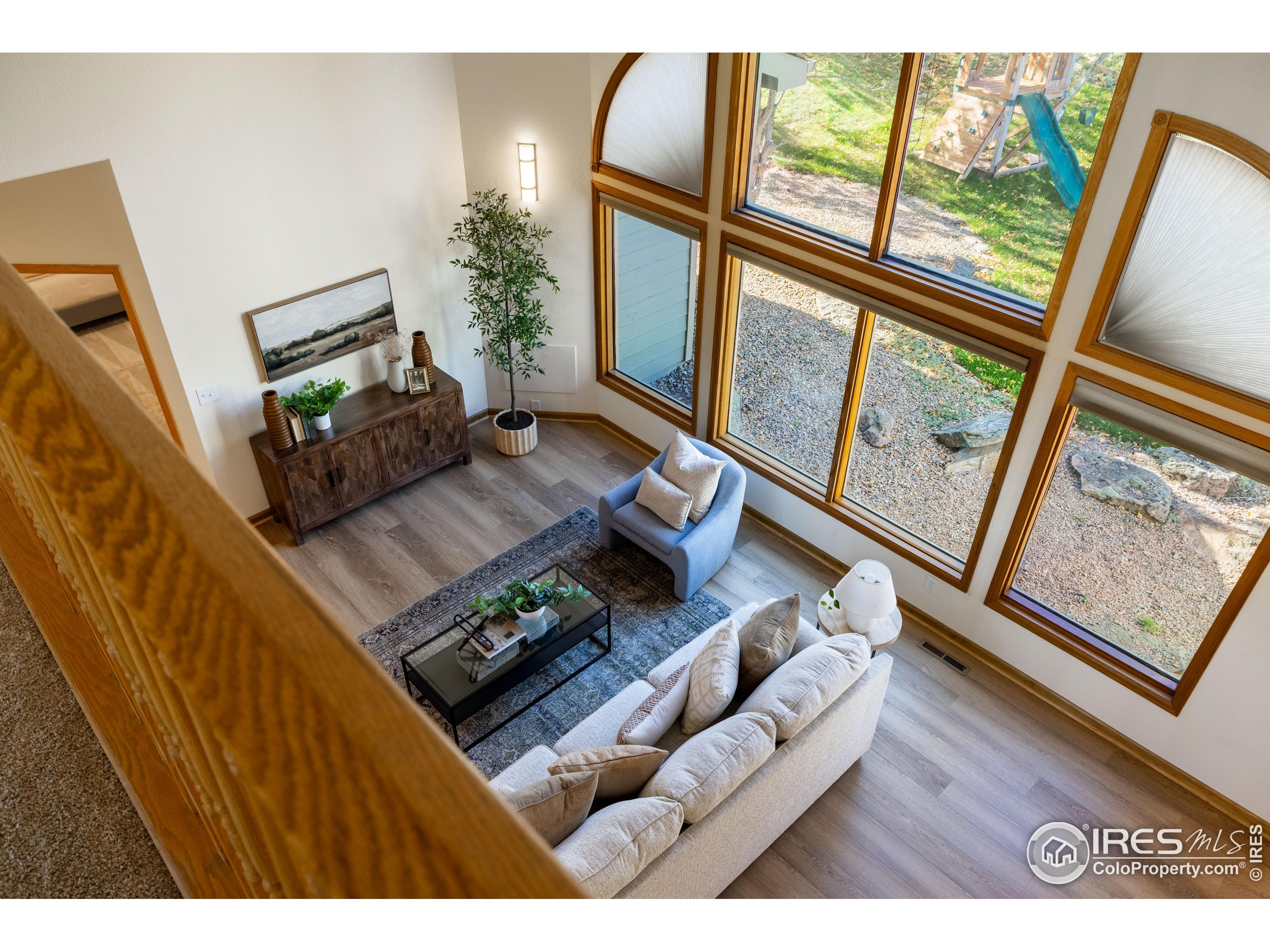 6465 Hidden Springs Road Fort Collins, CO 80526 - Photo 15 of 50 a living room with furniture and a window
