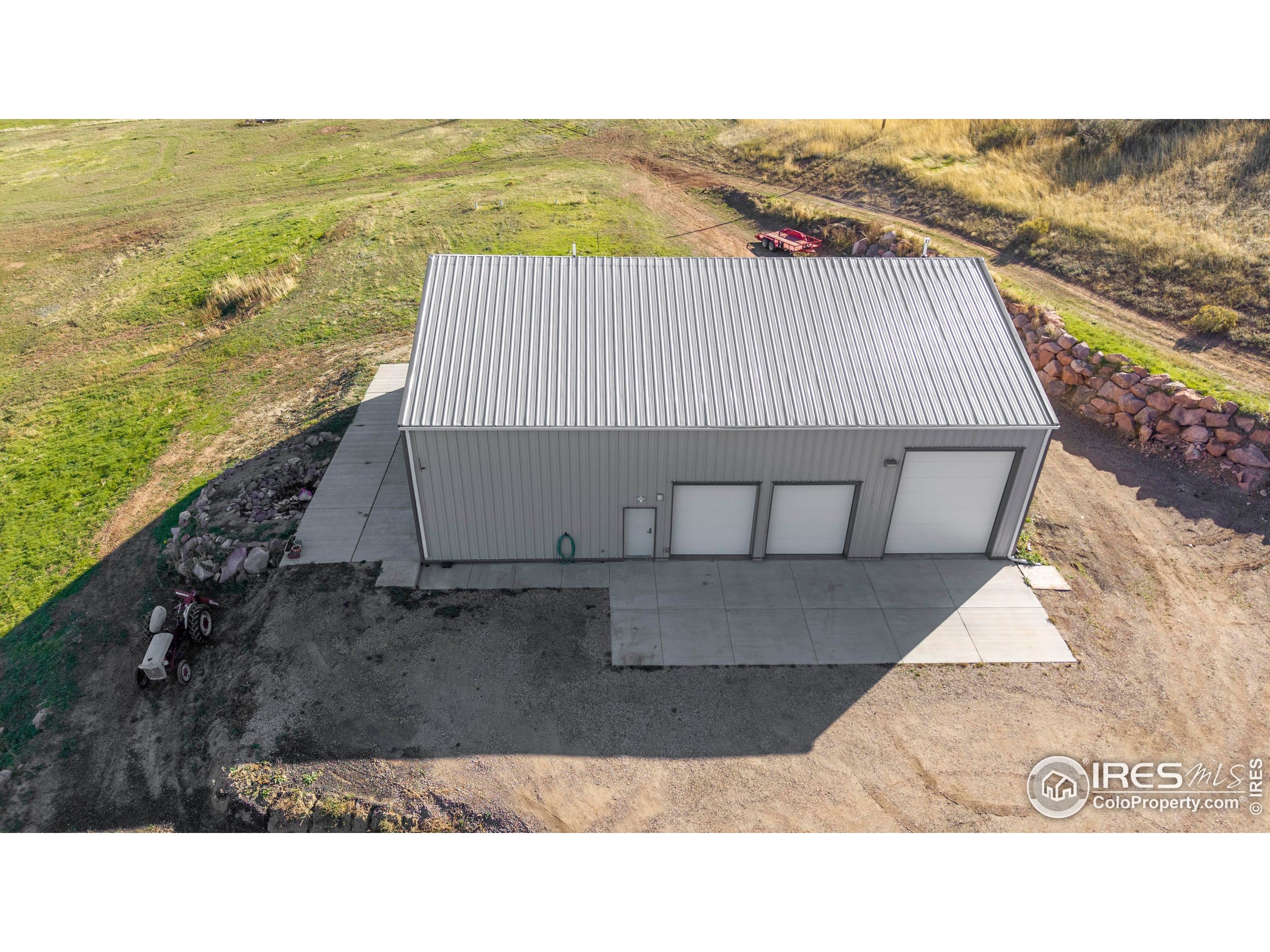 6465 Hidden Springs Road Fort Collins, CO 80526 - Photo 29 of 50 a picture of a building with an outdoor space