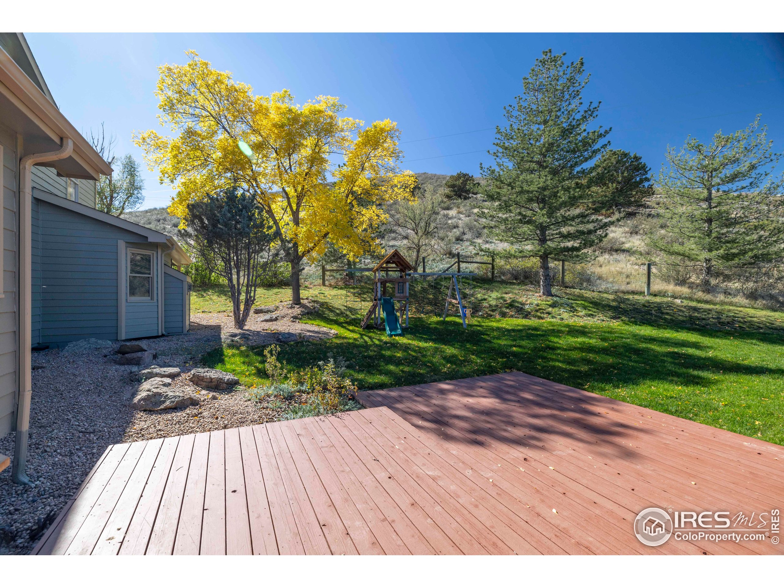 6465 Hidden Springs Road Fort Collins, CO 80526 - Photo 30 of 50 a view of backyard with green space