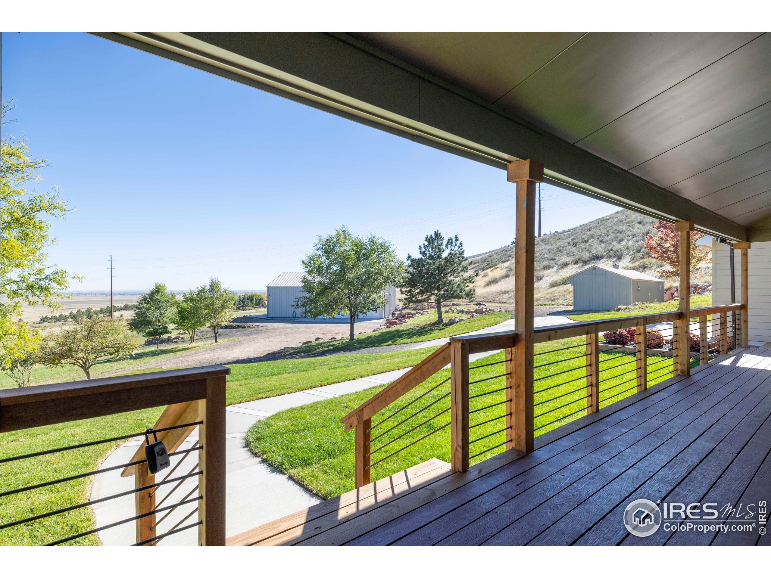 6465 Hidden Springs Road Fort Collins, CO 80526 - Photo 7 of 50 a view of an outdoor space and deck