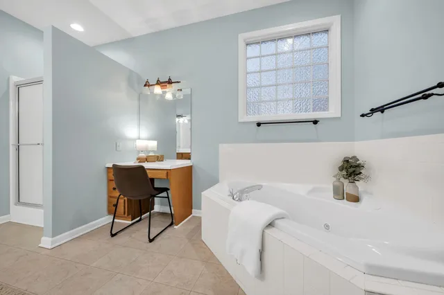 a bathroom with a sink and a bathtub