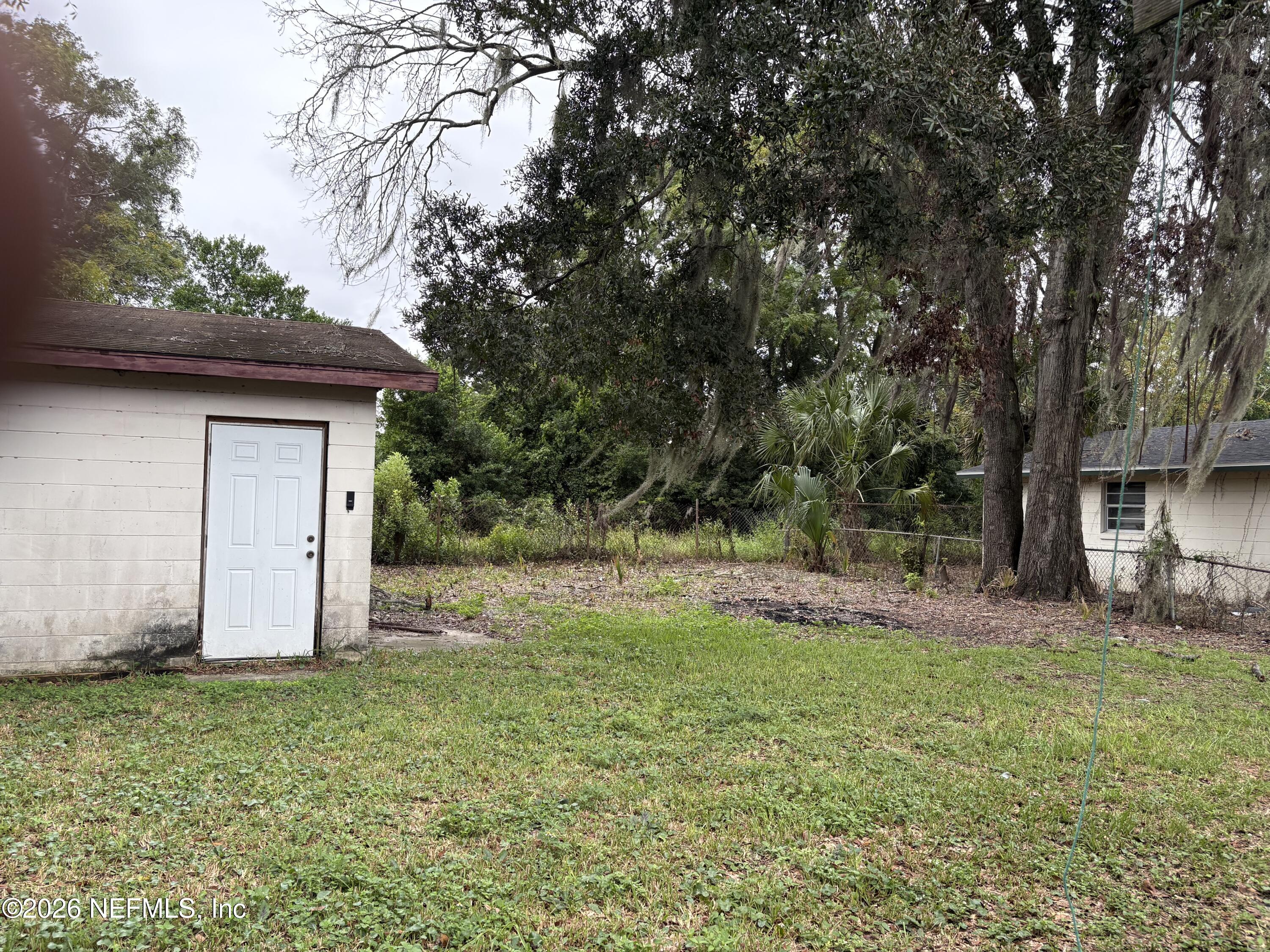 2344 Rogero Road Jacksonville, FL 32211 - Photo 22 of 26 Backyard 1 100826