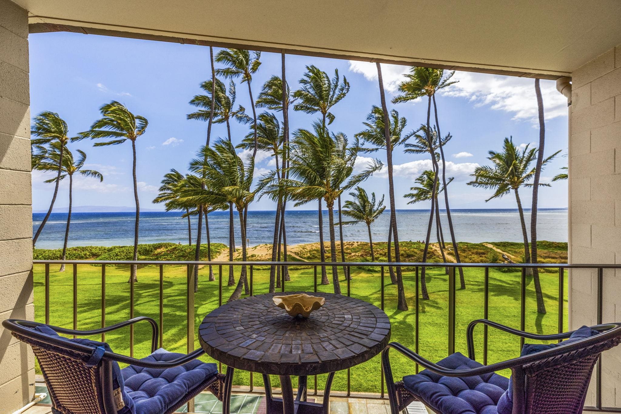 1310 Uluniu Road, Unit 317 Kihei, HI 96753 - Photo 12 of 50 a view of a chairs and table in patio