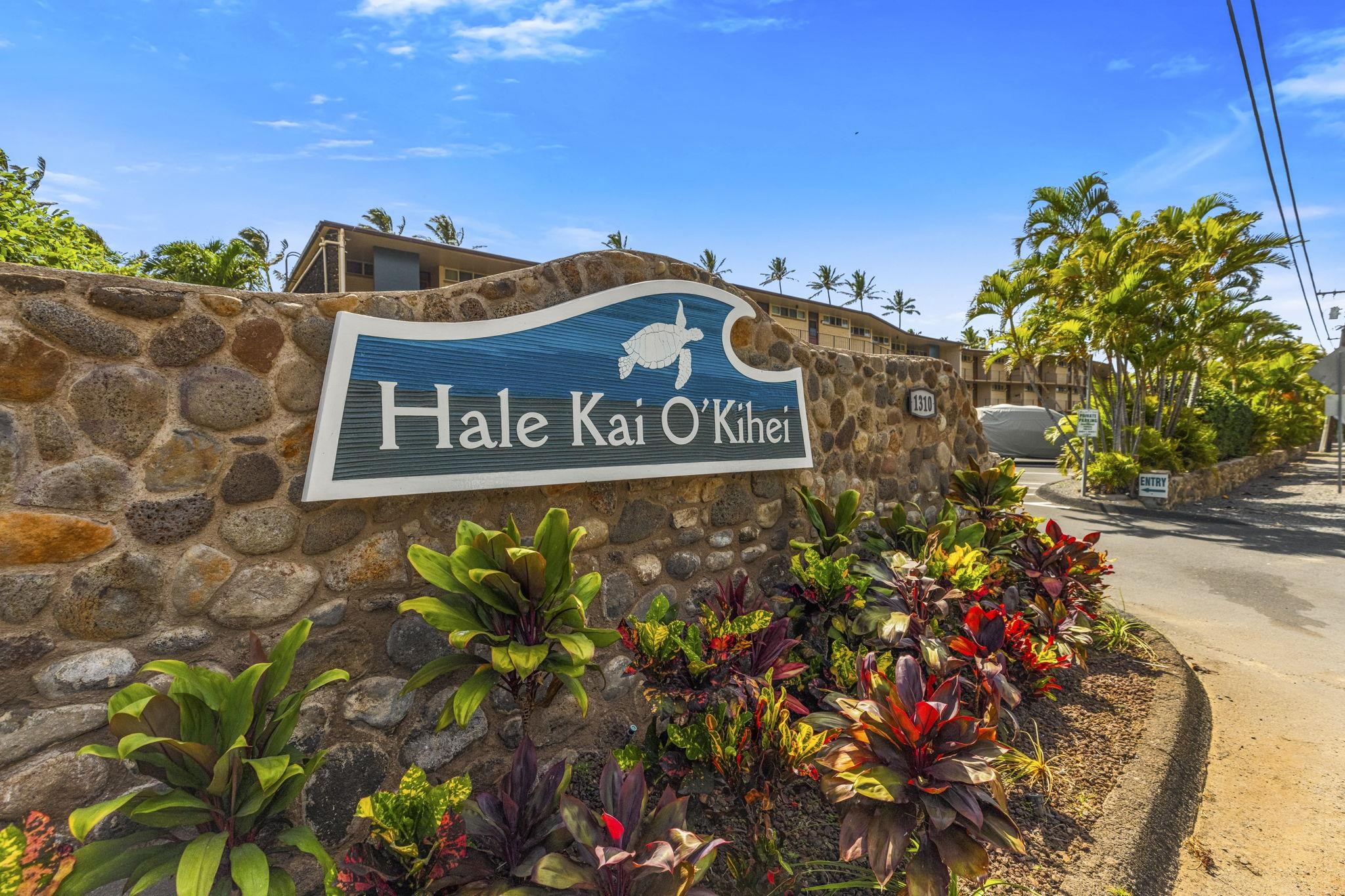 1310 Uluniu Road, Unit 317 Kihei, HI 96753 - Photo 32 of 50 a view of a sign board with buildings