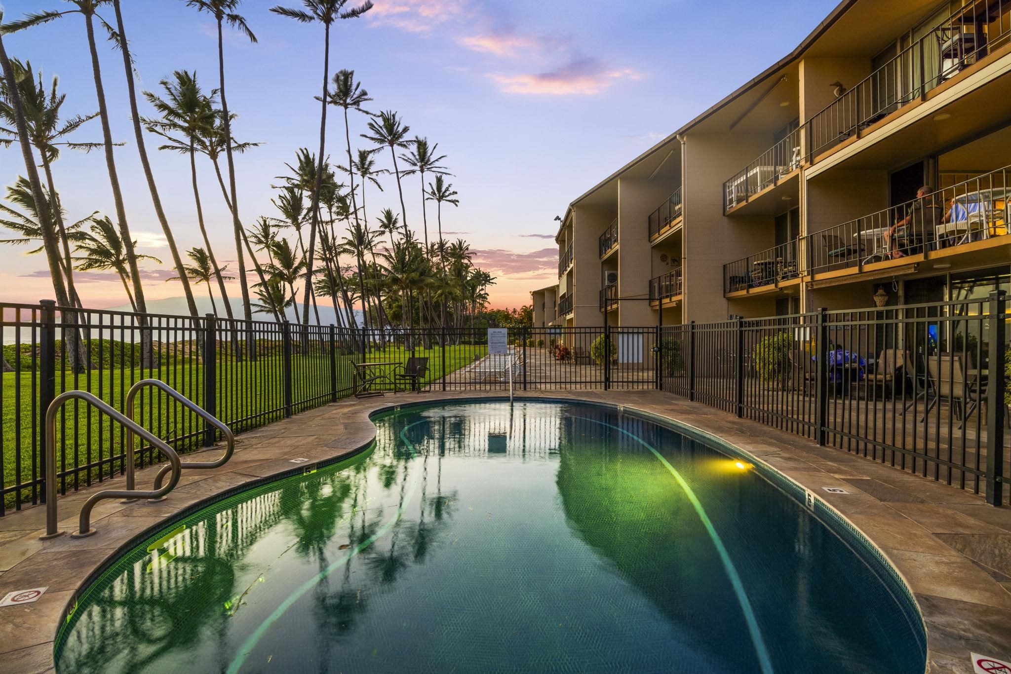 1310 Uluniu Road, Unit 317 Kihei, HI 96753 - Photo 45 of 50 a view of a swimming pool with a patio