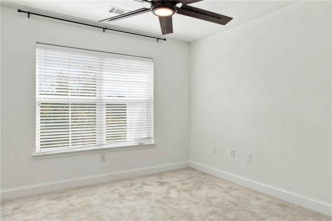 636 Lookover Drive Anderson, SC 29621 - Photo 23 of 34 Soft carpet underfoot couples with a wide window to create a serene, light-filled space.