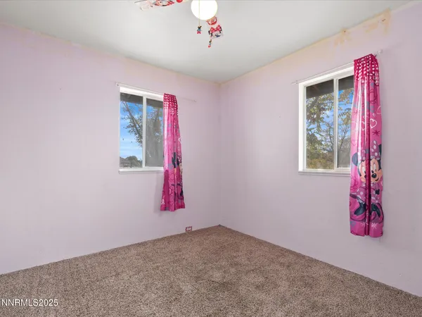 a very nice looking room with a flat screen tv