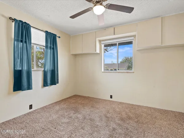 a view of an empty room with window
