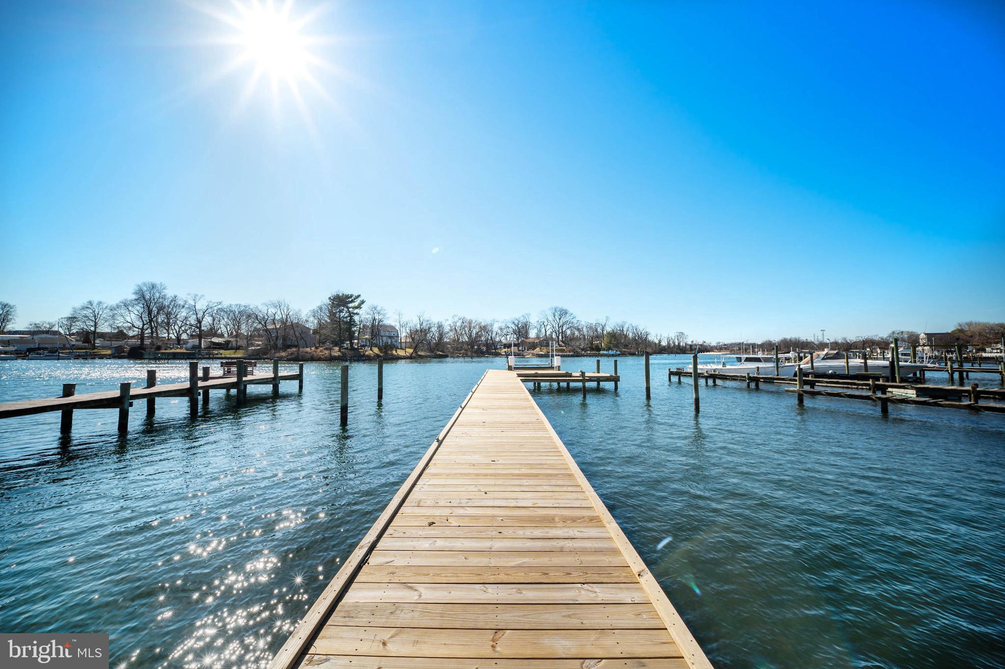a lake view with a couple of boats